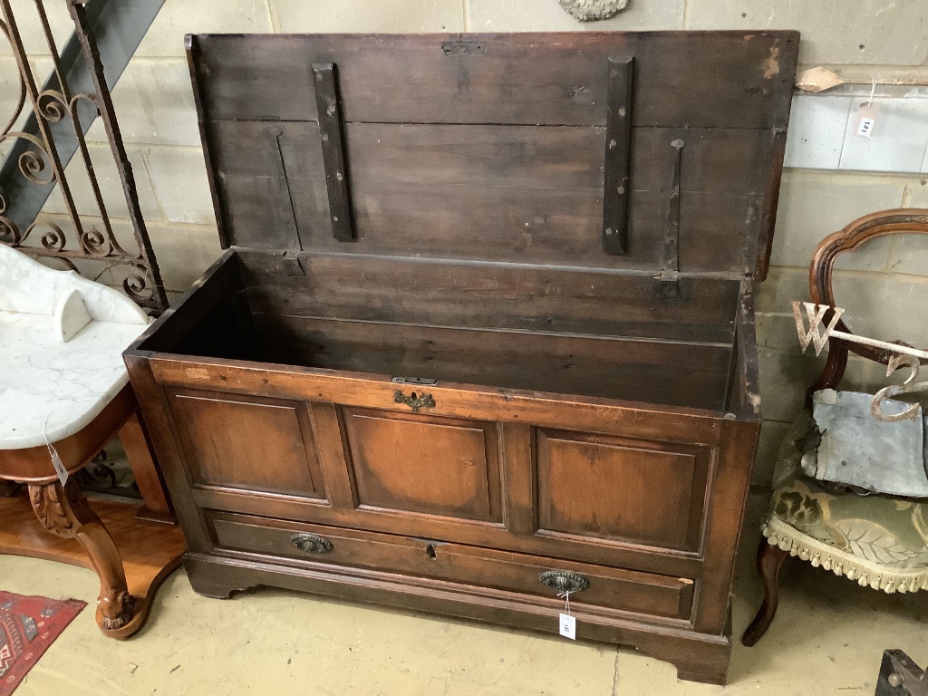 An 18th century panelled pine mule chest, length 128cm, depth 51cm, height 76cm
